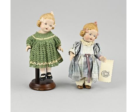 Two antique German bisquit porcelain Heubach dolls. Circa 1910. Elsbeth. Dimensions: 19 cm. In good condition.