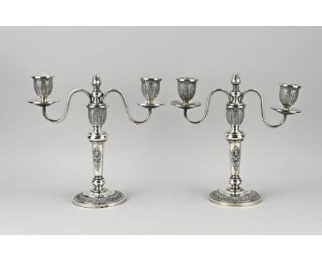 Two silver table candlesticks, 925/000, Siam silver, on a round base with 2 arms and 2 lights. The candlestick has a Siam dec