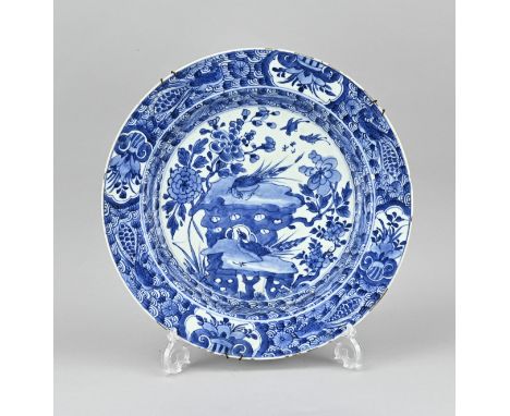 Large 17th century Chinese porcelain dish with floral/bird on boulder decor. Flakes/edge frit. Dimensions: diameter 35.4 cm. 