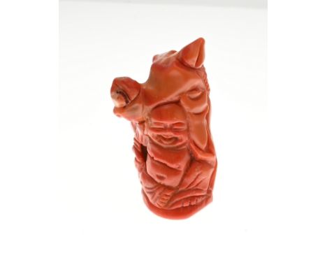 Statue made of carved coral depicting a Buddha. 6x3 cm. approx. 51.6 grams. In good condition.