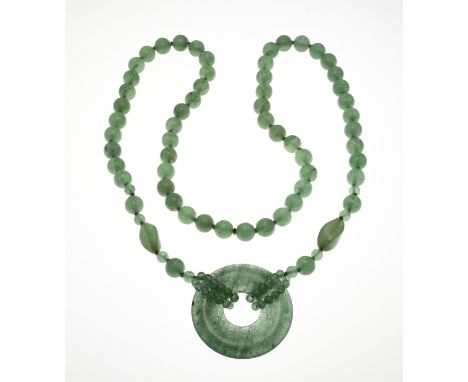 Necklace of jade beads with amulet. Necklace of round beads, Ã¸ 10 mm. some smaller round beads 4.5-6.5mm. Length 75 cm. appr
