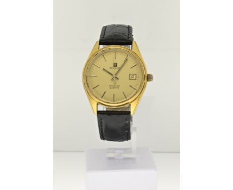 Double Tissot watch with a yellow dial with a date display. Ã¸ 35 mm. Quartz. The watch has a black leather strap. In good co