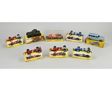 Lot with eight various Dinky Toy toy cars. With original packaging. Light signs of use. Size: 7 - 12 cm. In good condition.