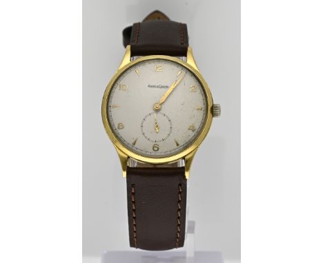 Yellow gold Jaeger Lecoultre, 750/000, mechanical, round case, Ã¸ 33 mm, with a cream-colored dial and a decentralized second