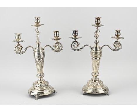 Pair of antique silver candlesticks, 835/000, 3-light candlesticks on a round base with 3 decorated claw feet decorated with 