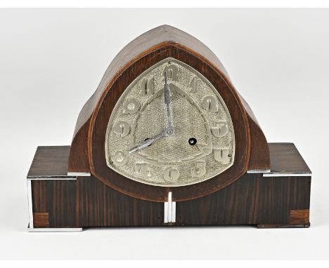Amsterdam School-style mantel clock made of oak, coromandel wood and chrome. Circa 1930. Half-hour strike on three gong rods.