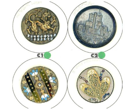 4 Large 19th century steel cup buttons including pictorial.This lot from the collection of Nikki Deal includes a pewter cente