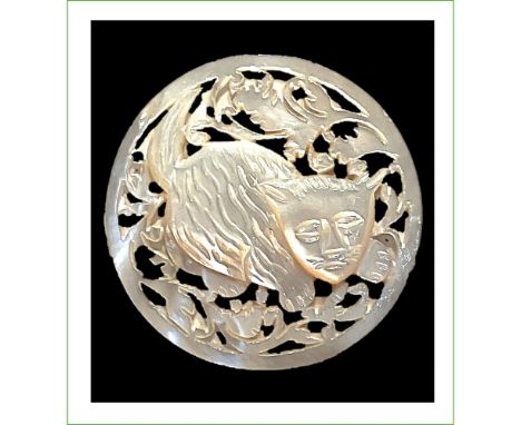 1 Large 20th century hand carved and pierced pearl button.Here is a wonderfully detailed and pierced pearl from Jerusalem in 