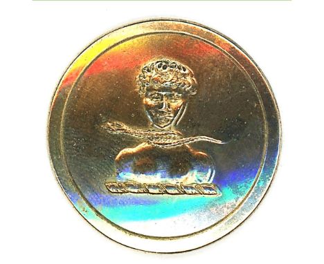 A medium 19th C. brass family crest button with a nude &amp; snake.Here is an unusual depiction on a crest button, notice the