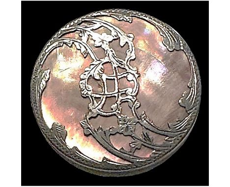 1 large size 19th century beautiful silvered pattern button.There is a beautifully chatoyant pearl set in a very fine silvere