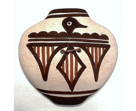 1 Large 21st century button by Eileen Yatsattie of New Mexico.Here is a wonderful example of her work showing the Zuni Rain B