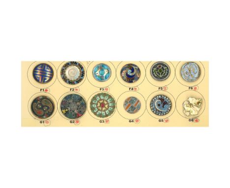 12 Medium size assorted technique 19th/20th C. enamel buttons.This lot includes a very nice Arts and Crafts Liberty style ena