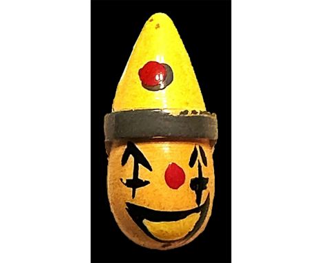 1 Large medium size butterscotch Bakelite clown button.Here is a cool realistic shaped clown head with hand painted accents. 