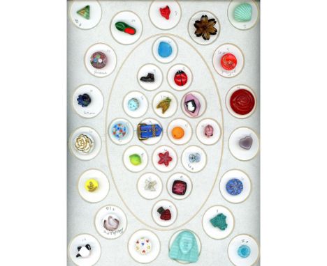 35 S/M/L assorted 20th century glass buttons including pictorial.Here is a nice card of assorted colored glass buttons includ