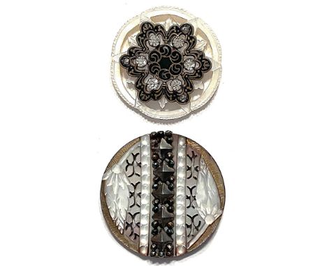 2 Large 19th century pierced and embellished pearl buttons.This card includes a beautiful carved pierced shaded pearl with de
