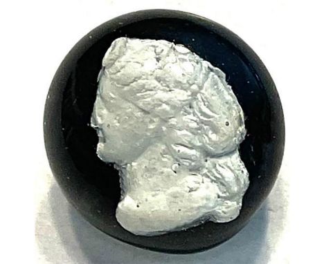 1 19th century head button made of sulfide, black glass button.This button is a rare example from the 1800's. The button was 