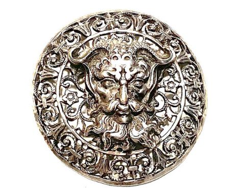 1 Large early 20th century silvered brass detailed button.Here is an incredible button, at least in this cataloguers opinion.