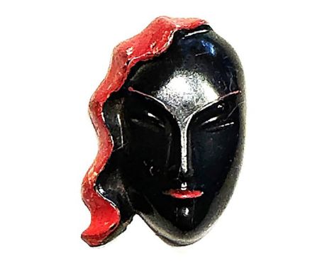 1 Large size early 20th century realistic shape button.This very cool button in striking black and red is made of celluloid a