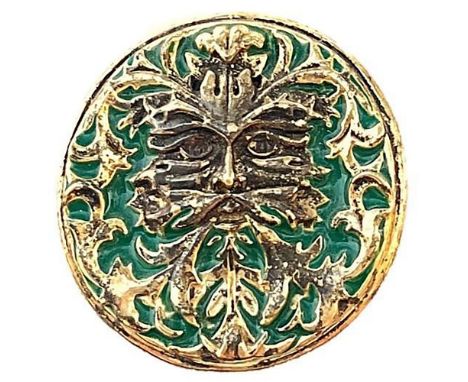 1 Large size 29th century backmarked enamel and brass button.Collectors seem to gravitate to these "Green Man" creatures. Thi