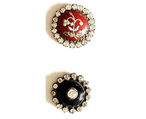 2 Small 18th and 19th century paste bordered enamel buttons.In this lot from the collection of Nikki Deal you will find a gor