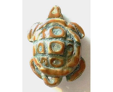An extra large size 20th C. realistic ceramic pictorial button.This large realistic shaped detailed turtle is signed AH for A