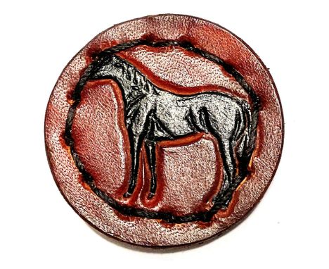 1 Large 20th century 2 tone leather button of a horse.This button s a finely detailed pictorial of a full bodied horse and in