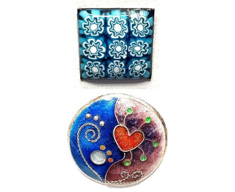 2 Medium 21st C. enamel buttons including one by Karen Cohen.This lot includes a high quality example from the studios of Kar