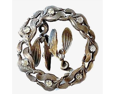 1 Large medium early 20th century silvered brass Iris button.This beautifully made button is pierced and shows an Iris flower
