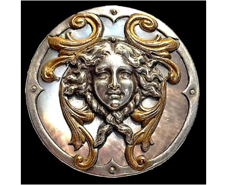 1 Large 19th century two toned metal Medusa head button.This gorgeous pearl background is set in a fine quality mounting. The