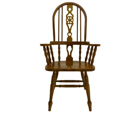 Hardwood Windsor armchair, hoop and stick back with pierced wheel splat, on turned supports with double H stretcher Dimension