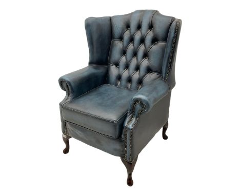 Georgian style wing back armchair, upholstered in blue button back leatherDimensions: Height:&nbsp;112cm&nbsp; Length/Width:&