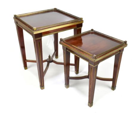 Two late 19th/early 20th century Russian gilt metal mounted and mahogany lamp tables of square form, with brass galleries and
