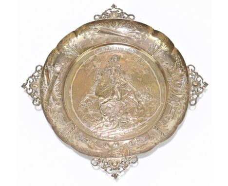 A 17th century German embossed shallow bowl with four pierced handles and central figural scene inscribed 'Prinz Evgen &amp; 