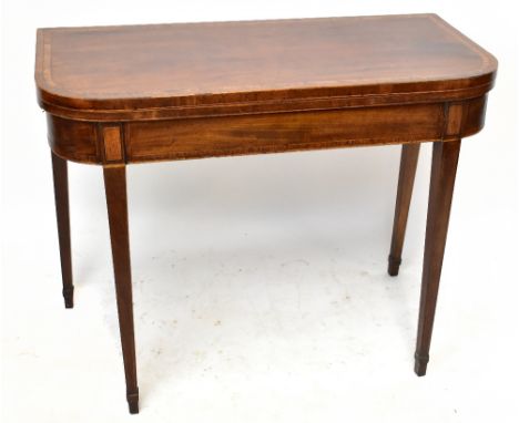 A Georgian mahogany fold over card table with crossbanded decoration, on spade feet, width 91cm, depth 44cm, height 72cm.