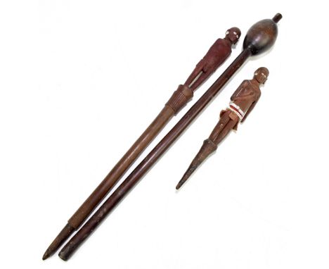 An African knobkerry with ovoid end terminal, length 62cm, and two modern carved figures (3).Additional InformationThe knobke