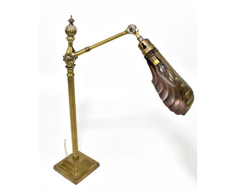 DUGDILL PATENT; an Edwardian brass desk lamp with adjustable/rotating arm and open shell shade, impressed marks, height 53cm.
