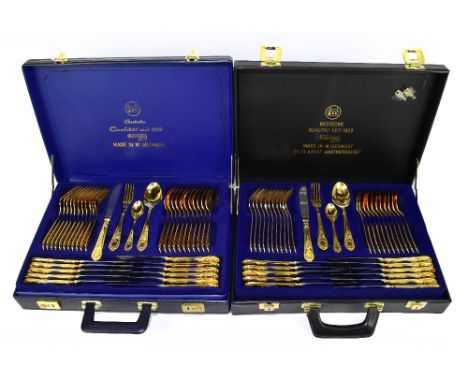 SOLINGEN; two briefcase cased sets of cutlery.