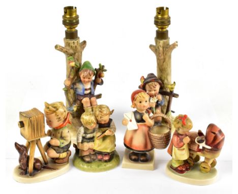 HUMMEL; a pair of figural lamps and four small figures (6).