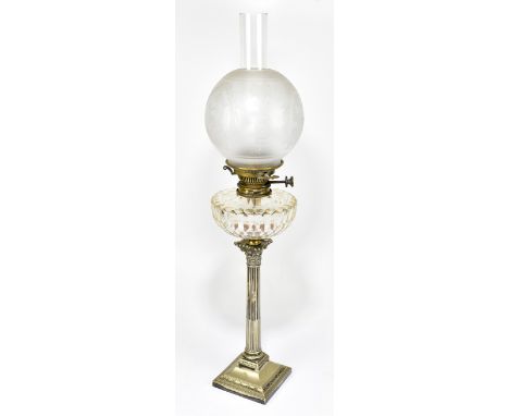 A late 19th century electroplated Corinthian column oil lamp, with a frosted glass shade, height including chimney 76cm.Addit