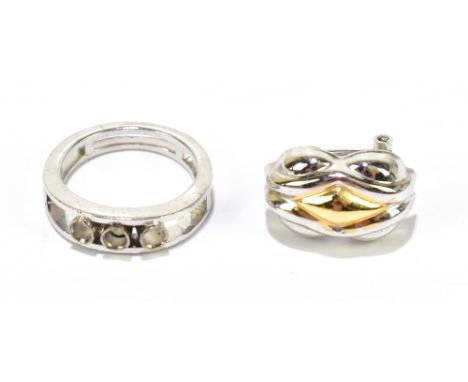 A single white metal earring stamped 585, approx. 2.1g, and an unmarked white metal ring mount (lacking stones), approx. 5.7g