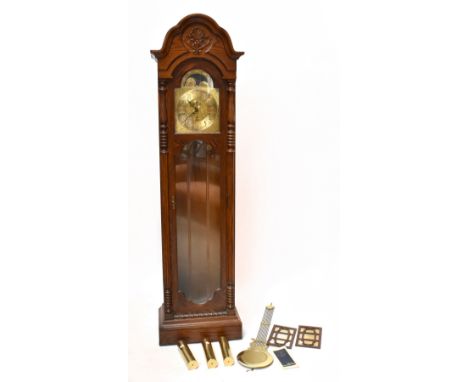 A modern oak longcase clock, the brass face with moon phase mechanism, the chapter ring bearing Arabic numerals and subsidiar