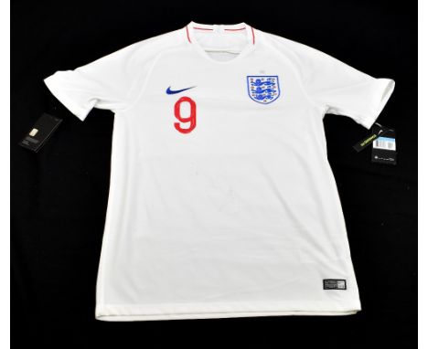 HARRY KANE; a Nike England shirt, signed to the reverse, size M.Additional InformationCreasing and light general wear, no cer