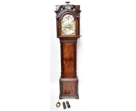 A George III mahogany longcase clock, the swan neck pediment with verre&nbsp;églomisé above arched brass dial set with rollin