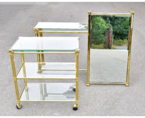A mid-century Italian gilt metal console table, height 76cm, width 113cm, depth 35cm with a matching trolley and mirror (3).