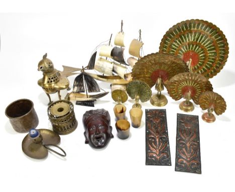 An assortment of Eastern and European metalware including a beaker with embossed stylised decoration of mythical animals, Ind
