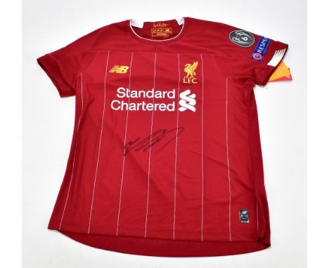 MOHAMMED SALAH; a Liverpool Premier League winners home shirt, signed to the front, size 14.Additional InformationCreasing an