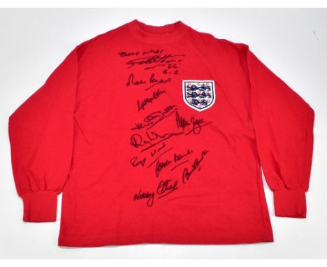 ENGLAND; a 1966 World Cup winners shirt, signed to the front by Banks, J. Charlton, B. Charlton, Hurst, Peters, Ball, Wilson,
