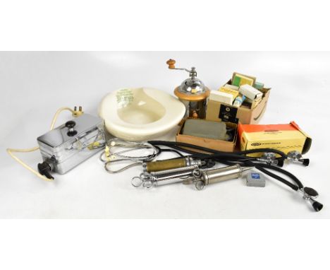 An assortment of vintage medical ephemera and equipment including a Royal Winton Original Perfection douche pan, stethoscopes