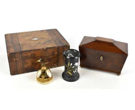 A tea caddy of sarcophagus form, a walnut workbox, an Ashford vase and an unusual desk bell on a white onyx base set with mot