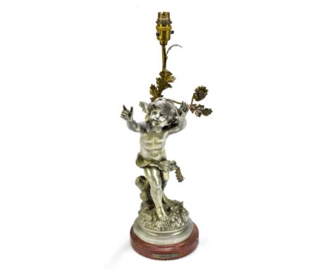 AFTER AUGUSTE MOREAU; a silvered metal figural table lamp modelled as a cherub on socle base, height 51cm.